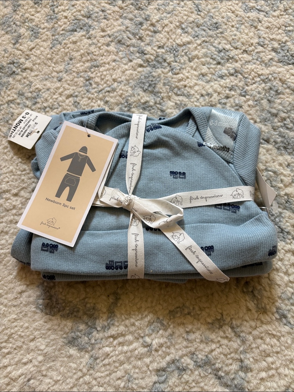 First Impressions Light Blue Newborn Pajama Set with Navy Train Print